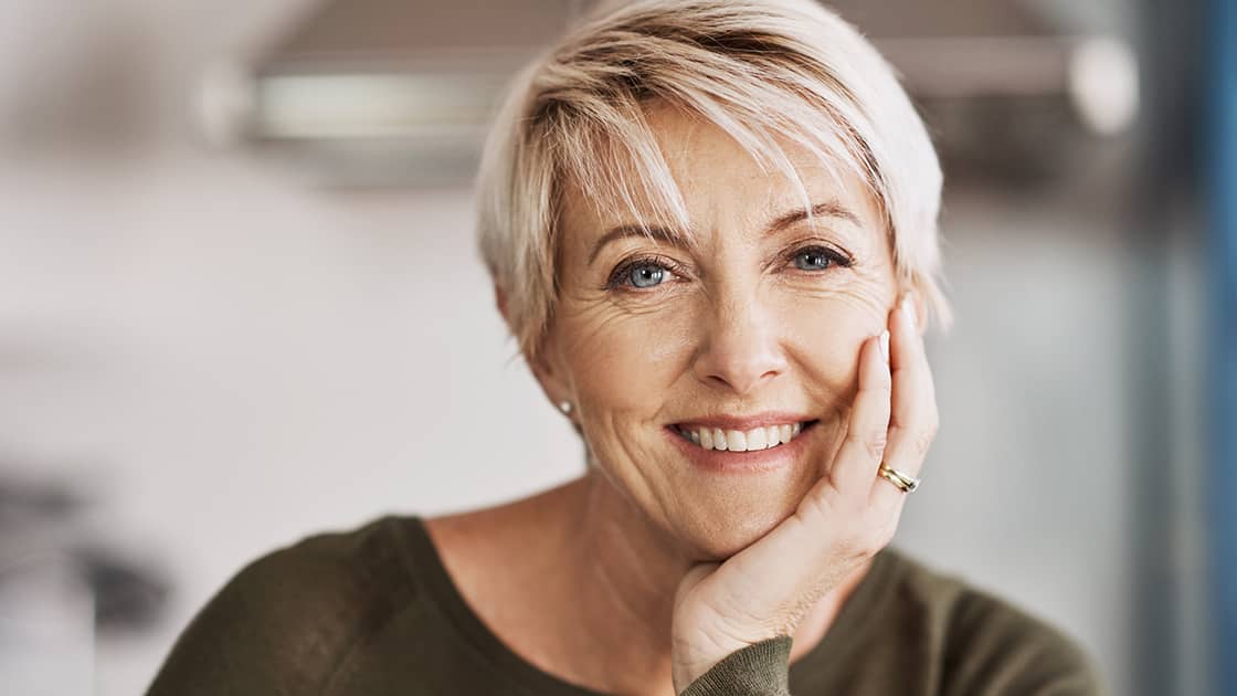 Mature woman with healthy teeth photo